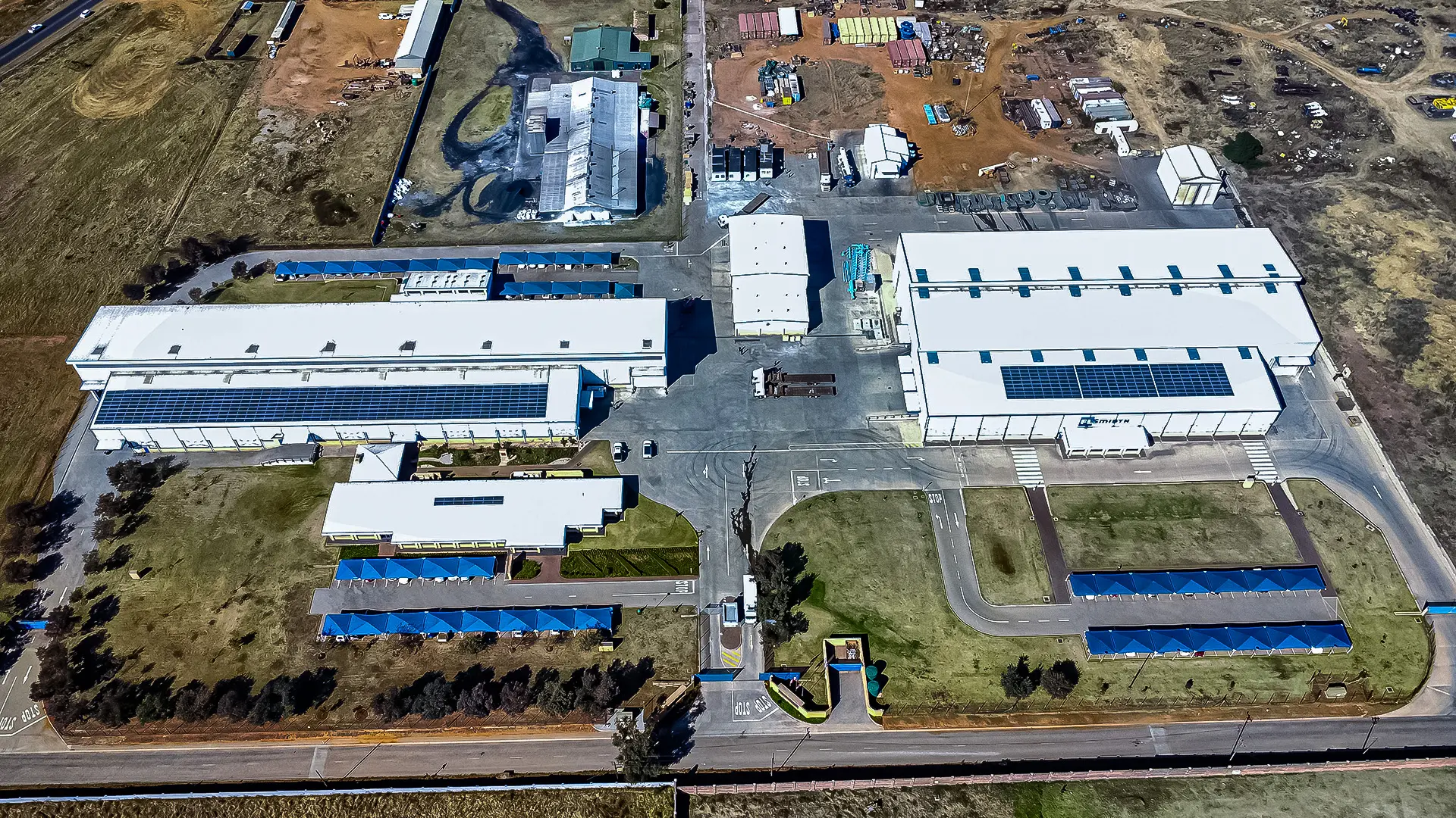 Large industrial warehouse complex with modern roofs in Johannesburg
